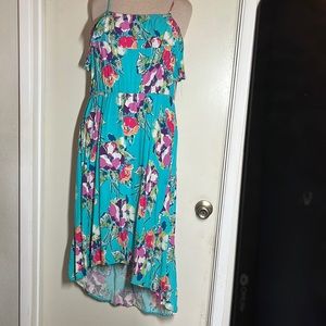 Spaghetti strap maxi with flutter detail top. Floral turquoise. Asymmetrical